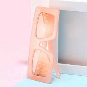 Oversized rectangle peach pink sunglasses with hollow gold metal geometric temple design