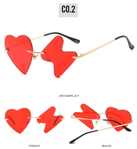 Funny sunglasses with red heart and lightning lenses plus sleek gold metal temples
