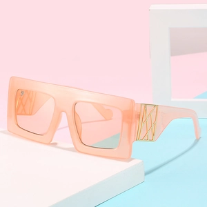 Oversized peach orange square sunglasses with gradient lenses and gold temple detail