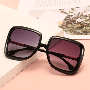 Women's oversized square sunglasses with black frame and purple-pink gradient lenses