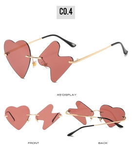 Detailed views of gold-framed rimless sunglasses with asymmetrical heart and lightning lenses