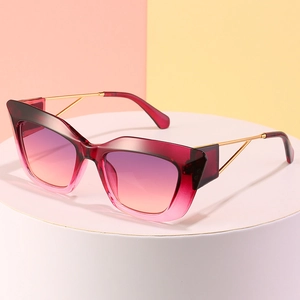 Chic oversized cat-eye sunglasses with purple gradient frame and golden metal temples
