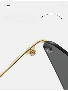 Detail of durable gold metal hinges and dark lenses on stylish novelty sunglasses