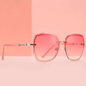Fashionable rimless square sunglasses with pink gradient lenses and silver metal details