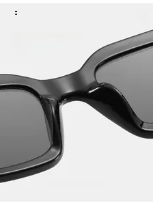 Detail of square black sunglasses showing smooth integrated nose pads for comfortable wear
