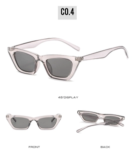 Multiple views of small cat eye sunglasses in transparent grey with dark lenses