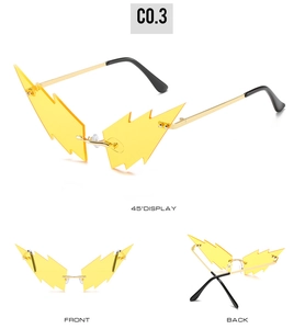 Detailed views of yellow lightning shaped rimless sunglasses with gold metal frames