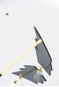 Close-up of lightning shaped lenses and gold metal frame with comfortable nose pads