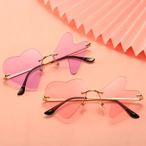 Frameless heart and lightning asymmetric sunglasses with gold metal frame for parties