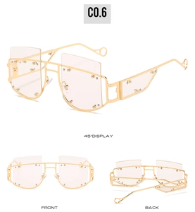 Detail view of square metal sunglasses with rivets and hollow temple tips