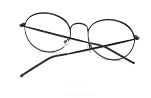 Detailed back view of vintage round black metal glasses frame with anti-blue light lenses