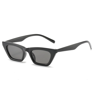 Vintage cat-eye sunglasses in solid black frame with dark grey lenses for women