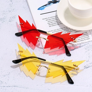 Fashionable lightning bolt rimless sunglasses with gradient lenses and gold metal frame