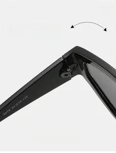 Macro shot of durable metal hinge on black cat eye sunglasses with model specifications