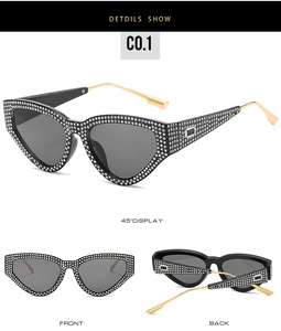 Cat eye sunglasses with rhinestones and gold metal temples in multiple viewing angles