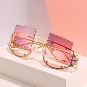 Oversized square rivet sunglasses with pink gradient lenses and gold metal frame