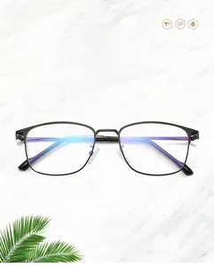 Detail view of anti-blue light lenses with purple reflection in black metal frame
