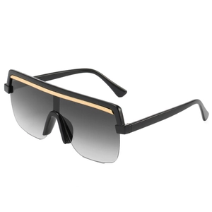 Oversized flat top shield sunglasses with gold metal trim and black gradient lenses