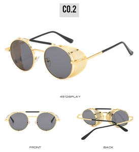 Détails de lunettes steampunk avec monture en métal doré et protections latérales