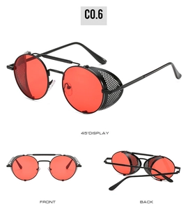 Vues de face et de profil de lunettes steampunk avec verres rouges et protections latérales
