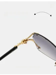 Detail of durable gold metal hinge on rimless gradient lens sunglasses for women