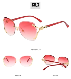 Three-view display of rimless gradient red sunglasses with intricate floral metal temples