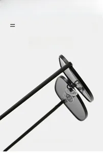 Detail of lightweight metal frame sunglasses with soft nose pads and precision hinges