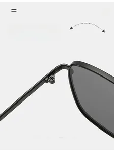 Macro detail of high-quality metal hinges on these vintage square sunglasses