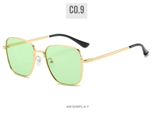 Detail view of retro square metal sunglasses with light green lenses and gold frames