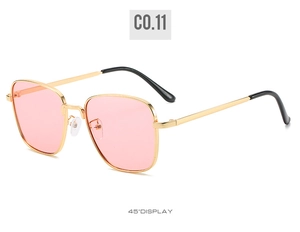 Side view of square vintage sunglasses with pink resin lenses and a gold metal frame