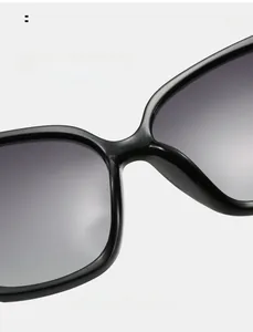 Detail of comfortable integrated nose pads on classic oversized black frame sunglasses