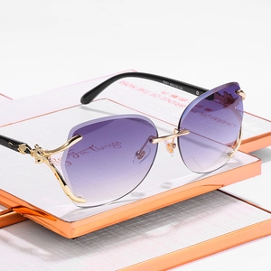 Elegant rimless fox sunglasses with purple gradient lenses and gold cheetah accents