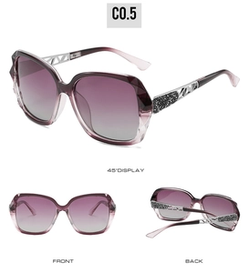 Detailed views of women's oversized sunglasses with purple lenses and silver rhinestone legs