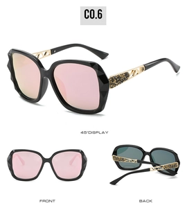 Detailed views of oversized square sunglasses with pink lenses and gold geometric temples