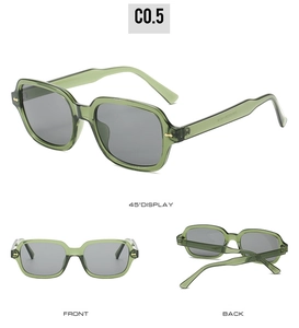 Detail view of olive green rectangle sunglasses with gold arrow studs and grey lenses