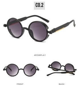 Detail view of steampunk round sunglasses with golden metal spring temples and purple lenses