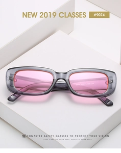 Close-up of model 9074 blue light blocking glasses with pink lenses and orange frame detail