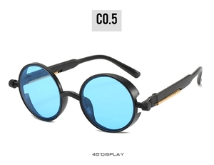 Detail of steampunk round sunglasses featuring blue lenses and gold spring hinge