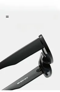 Detail shot of black thick frame sunglasses with size specs 8074 on temple arm