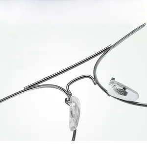 Macro detail of soft silicone nose pads and double bridge metal frame glasses