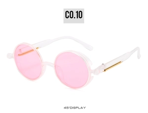 Detail of round steampunk sunglasses with pink lenses and golden spring metal hinges