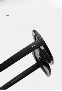 Detail view of high-elasticity black sunglasses frame with specifications on temple