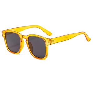 Classic square frame sunglasses with yellow transparent frames and dark lenses in 45-degree view