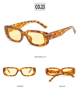 Detailed views of vintage tortoiseshell rectangle sunglasses with yellow tinted lenses
