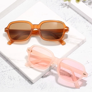 Retro square sunglasses with leopard and pink frames on marble background, UV400 fashion