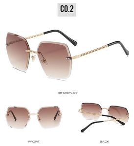 Frameless square sunglasses with gold chain temples and gradient brown hexagonal lenses