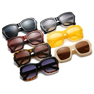 Collection of oversized square sunglasses in seven colors with silver rivet accents