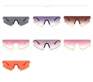 Detailed color selection of oversized shield sunglasses with metal frames and rivets
