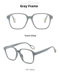 Detailsicht der großen grauen quadratischen Brille mit goldenen geometrischen Verzierungen