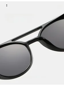 Macro shot of comfortable integrated nose pads and double bridge on black sunglasses